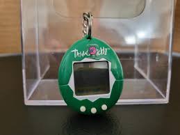 1997 Bandai Green Tamagotchi (Read | Mercari