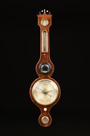 Lot - A GEORGE III STYLE SATINWOOD INLAID MAHOGANY FIVE GLASS WHEEL BAROMETER, CIRCA 1820-1840,
