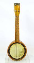 Sold at Auction: Winner Banjolele