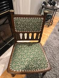 Any information on the greenman chair with oak leaf upholstery?