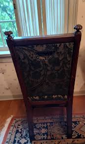 Young boy on a magnificent wicker chair, 1890 | Facebook