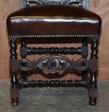 Antique Hand Carved Armorial Crest Coat of Arms Jacobean Dining Chairs, Set of 8 for sale at Pamono