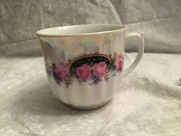 Bavaria tea cup. Pink roses blue forget me nots. Iridescent ...