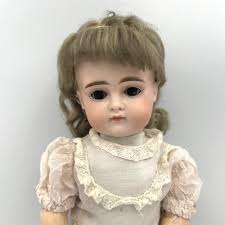 Lot - J.D. KESTNER POUTY FACE BISQUE-HEAD DOLL Germany, Circa 1910 Height 12".