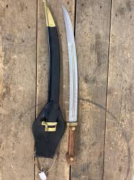 Sold at Auction: Curved Blade Sword