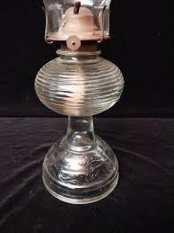 VINTAGE TALL GLASS OIL LAMP | EstateSales.org