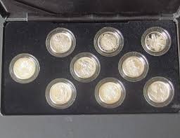 Sold at Auction: BRITANNIA 25th ANNIVERSARY 9-SILVER COIN SET