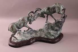 Porcelain Ram Head Sculpture With A Wood Base