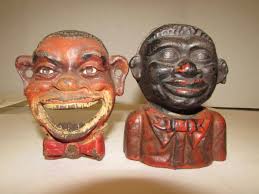 Sold at Auction: BLACK AMERICANA BOTTLE OPENER & STILL COIN BANK