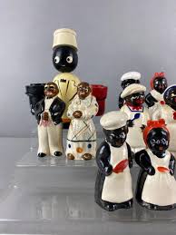 Sold at Auction: Group of 8 Black Americana Salt and Pepper Shakers