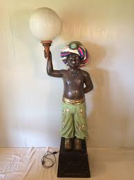 Sold at Auction: Circus Genie Lamp