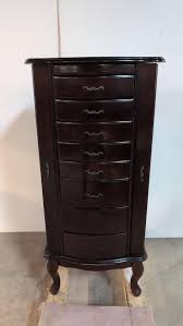 Sold at Auction: Mahogany Jewelry Cabinet