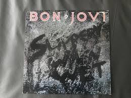 Sold at Auction: Bon Jovi Signed Slippery When Wet Vinyl LP ...