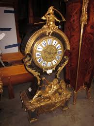 Bonhams : A Louis XIV style gilt bronze mounted brass and ...