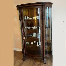 Antique Oak Bow Front Curio Cabinet | EstateSales.org