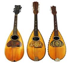 Lot - MUSICAL INSTRUMENTS: Three 20th C. mandolins including ...
