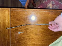 Stainless Steel rod, notched girthy end. Marked “RERWIG 15 ...