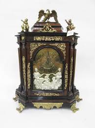 Lot - A LARGE ORMOLU-MOUNTED ROSEWOOD MANTEL CLOCK, Fren