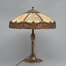 Three Light Slag Glass Table Lamp With Metal Overlay