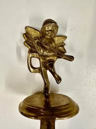 Antique Brass Cherub Stocking Holder | Chairish