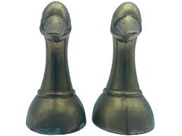 Sold at Auction: MID-CENTURY BRASS DUCK HEAD BOOKENDS (2)