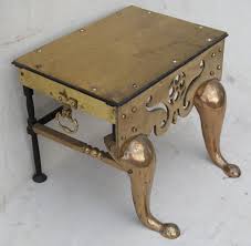 ANTIQUE BRASS FOOTMAN WITH SCROLLED ELEMENTS ON CABRIOLE ...