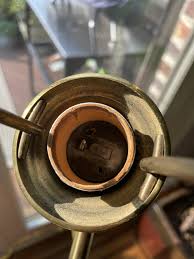 Mid century swing arm lamp - I was told it's a standard type a base, but my E26 light bulbs aren't working… is this thing junk on the inside? Or do I