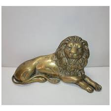 Vintage brass lion statue. For Sale at Ruby Lane