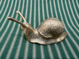 Brass Snail – Casa Anepalco