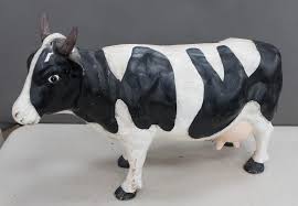 Lot - Cast Iron Figure of a Cow, Length: 17 in. (43.2 cm.)