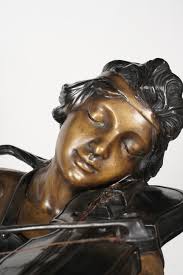 Lot - A Pair of Life-Size Bronze Figures of Musicians