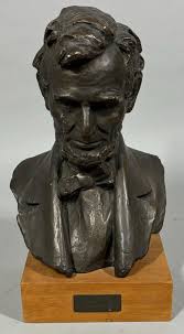 Lot - Abe Lincoln metal bust on wooden stand. (height with ...