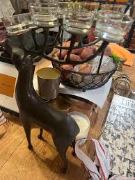Solid bronze reindeer candle holder