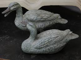 Sold at Auction: Two Small Bronze Ducks