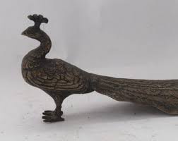 Escultura de pavo real griego vintage de hierro fundido: figura de pájaro de arte popular - Etsy España