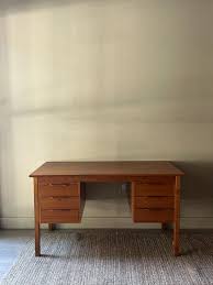 Teak desk – Good Behavior