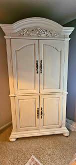 White wooden armoire