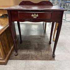 We spotted this little end table at the thrift store for $15 ...