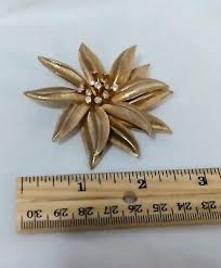 Vtg Flower 3D Gold Tone Metal Textured Brooch Round Clear Rhinestone Center Stem | eBay