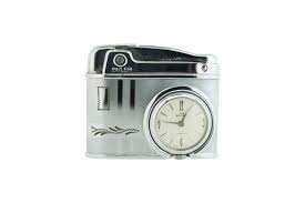 Sold at Auction: Buler manual wind watch with petrol lighter ...
