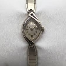 Bulova | Accessories | Vtg Bulova Watch Women 4mm 1k White ...
