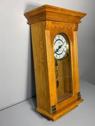Sold at Auction: Chiming Pendulum Wall Clock