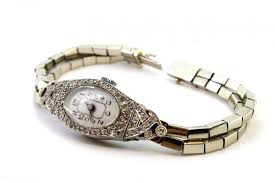 Gold and Platinum Watch with Cut-Out Case, Brilliant-Cut Diamonds and Double Parallel Bracelet for sale at Pamono