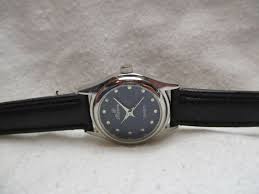 Riviera Analog Wristwatch with a Buckle Band and Quartz Movement | eBay