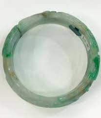 Sold at Auction: Natural Untreated Jadeite Jade Bangle