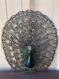 Lot 87DM. Vintage Midcentury Burwood Peacock decorative wall hanging, crystal headpiece, 1950-60's, 34”T x 30”W x 5”D“” $168.75 | EstateSales.org