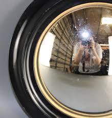 At Auction: Small French ebonized wood butler's mirror with convex glass