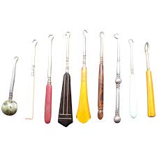 Nine vintage button hooks early 20th century in various materials . For Sale at Ruby Lane