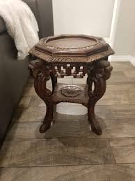 Carved side table