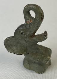 Sold at Auction: Vintage 1930's Cast Iron Elephant Bottle Opener w/ Original Paint